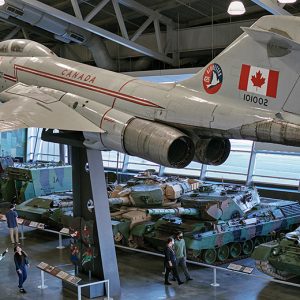 The Canadian War Museum in Ottawa showcases a historic plane hanging from the ceiling.